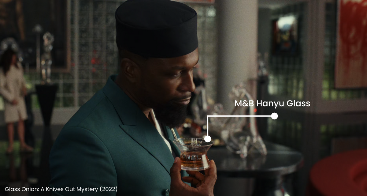 Still from Glass Onion featuring the M&B Hanyu glass