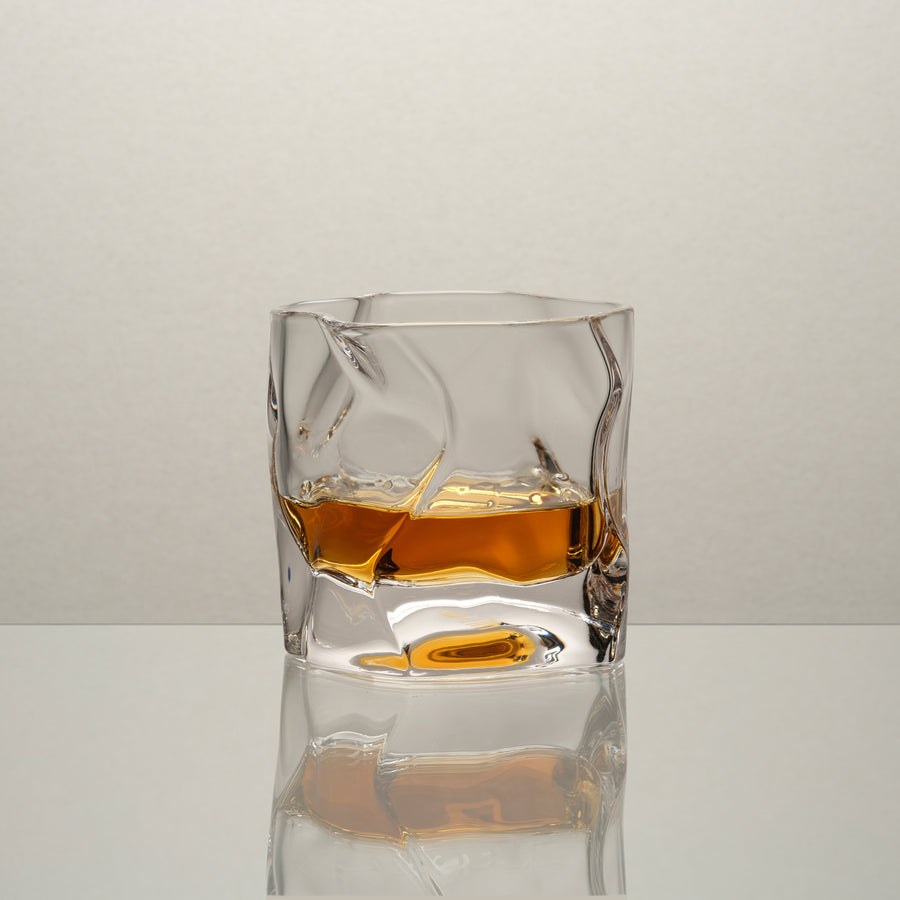 M&B Wave whisky glass with whisky on the rocks